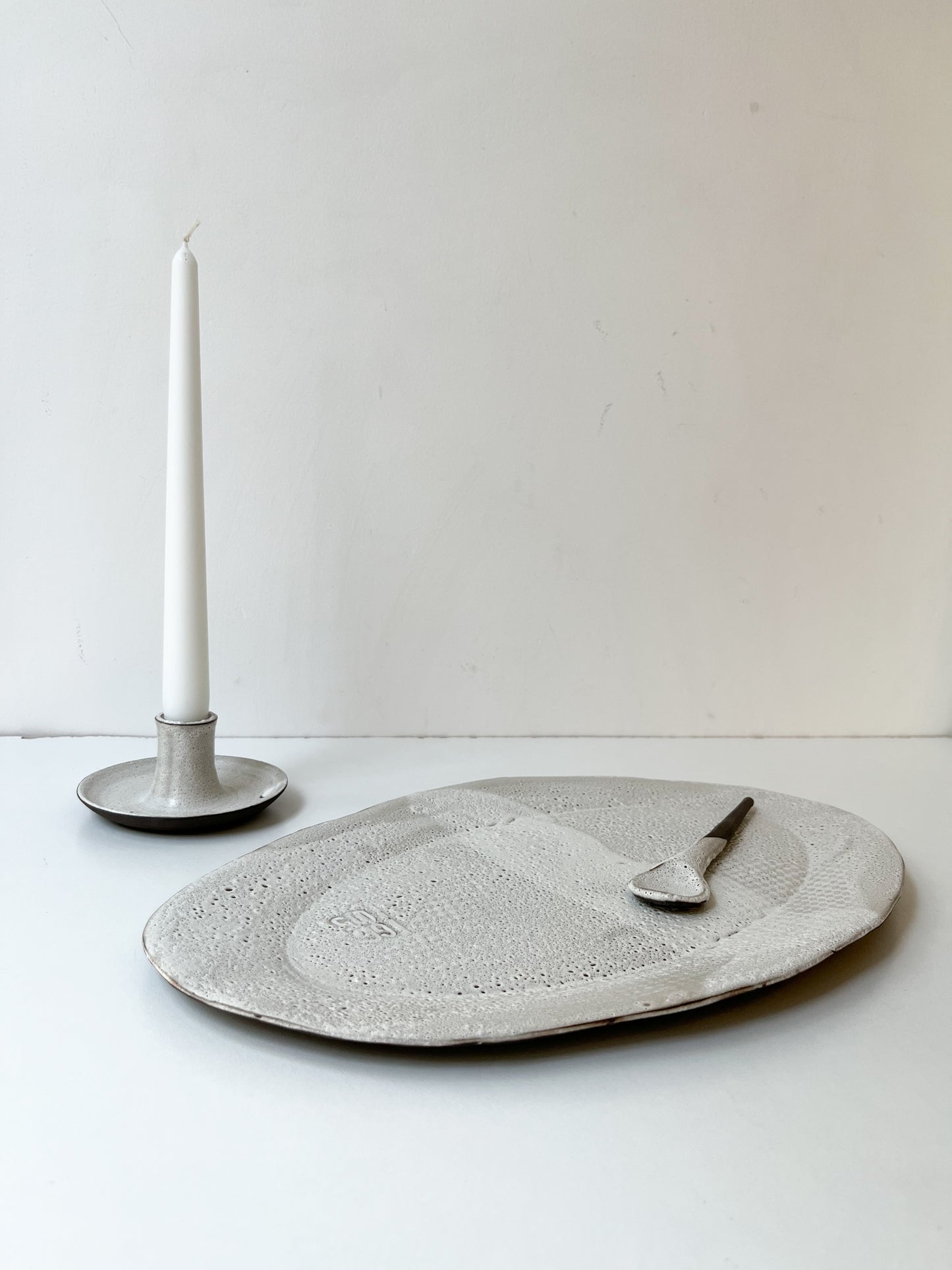 Lava saucer candle holder