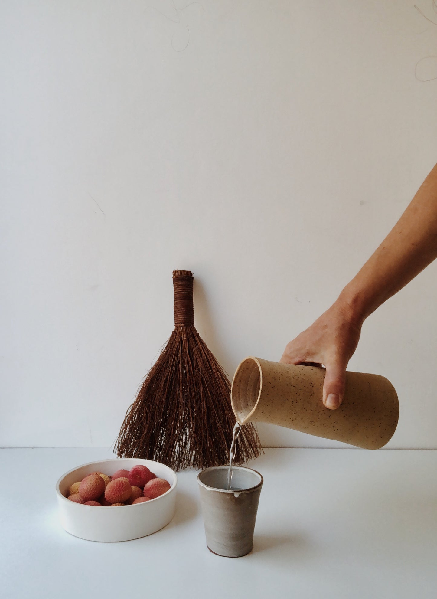 Raw speckled carafe