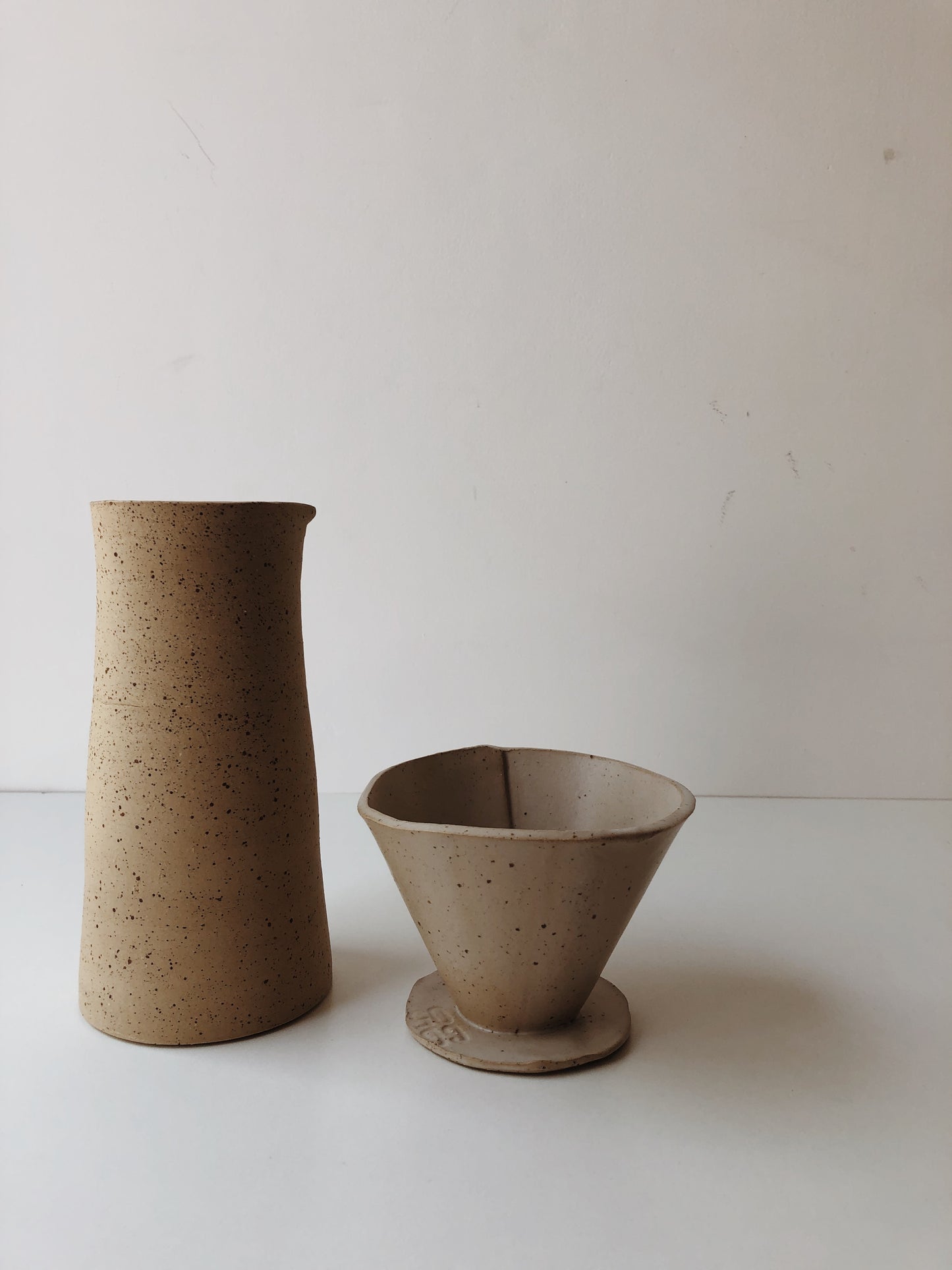 Raw speckled carafe