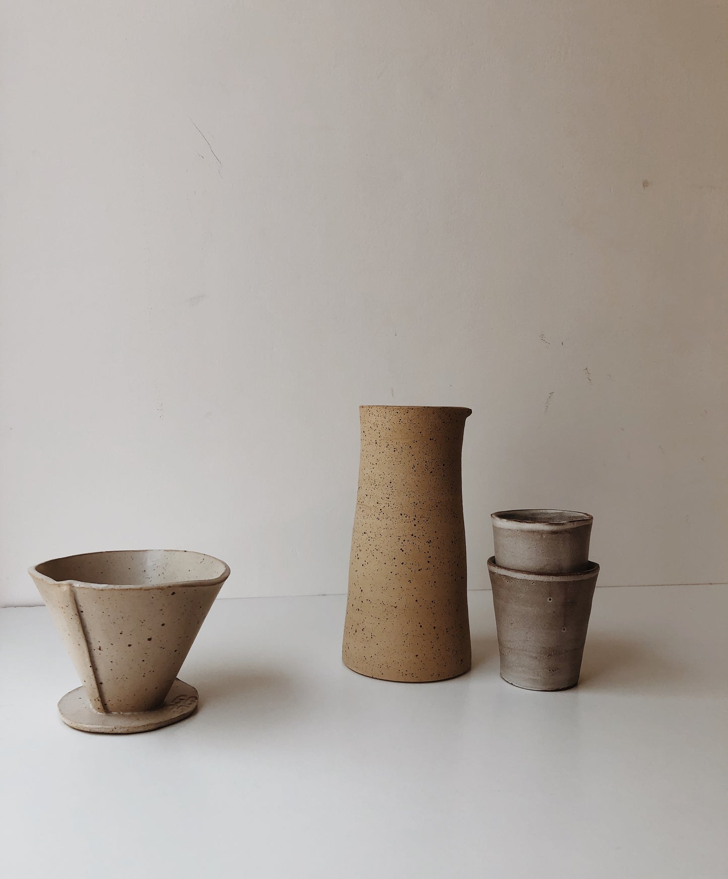 Raw speckled carafe