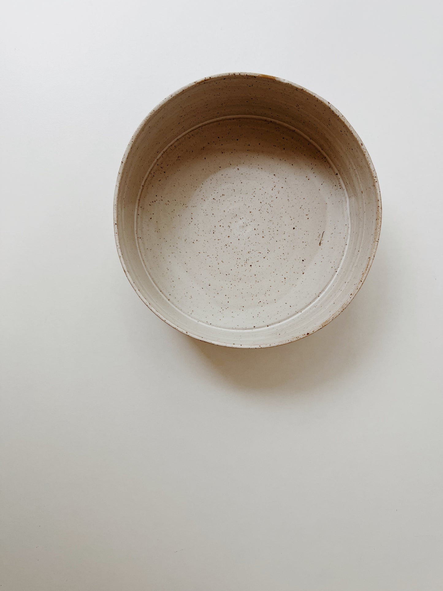 Speckled ceramic serving bowl